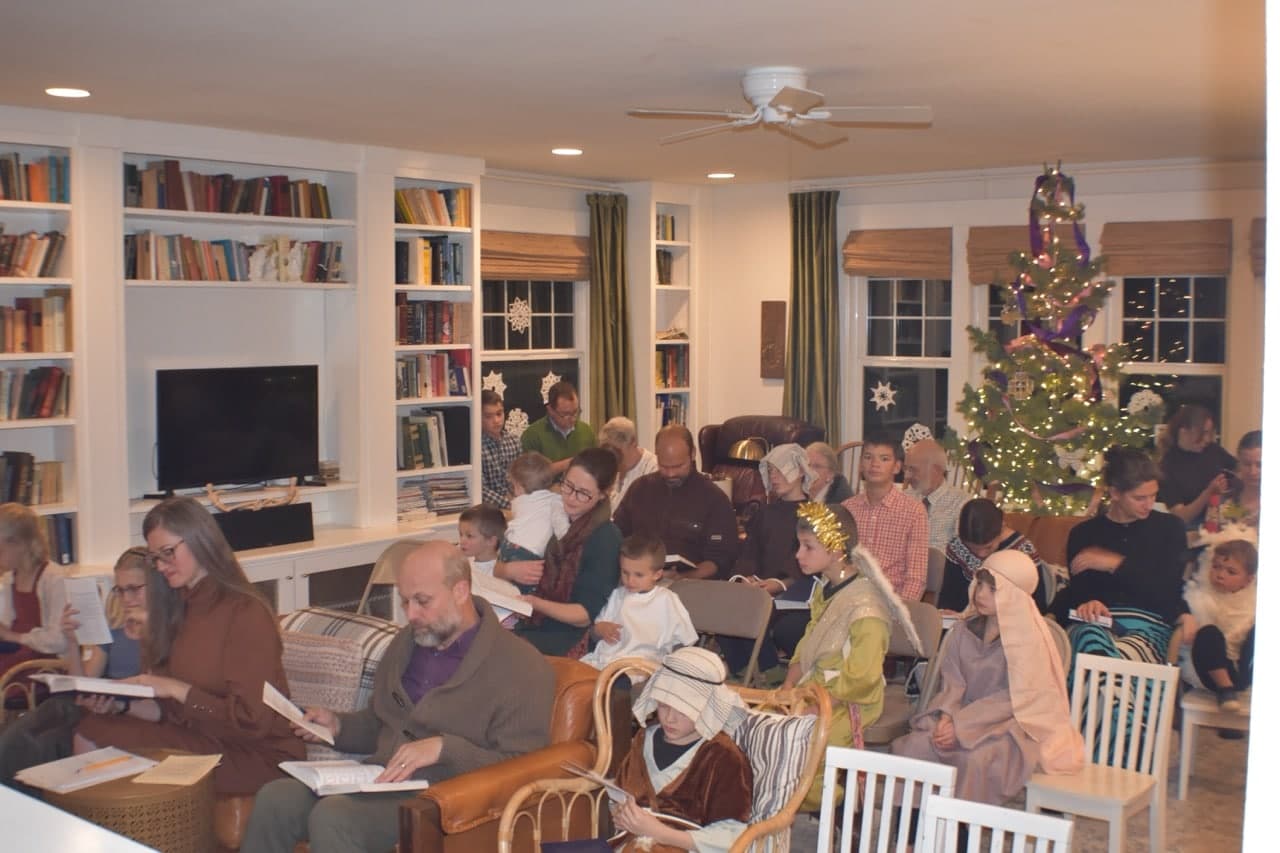 The congregation singing carols at Christmastide