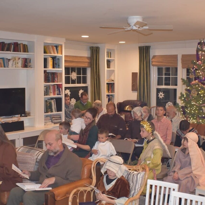 The congregation singing carols at Christmastide